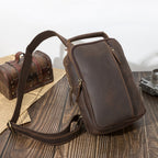Dark brown men's sling backpack, interior view