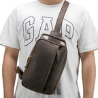 Dark brown men's sling backpack, front pocket detail