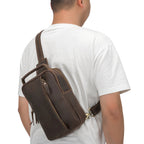 Dark brown men's sling backpack, hardware detail