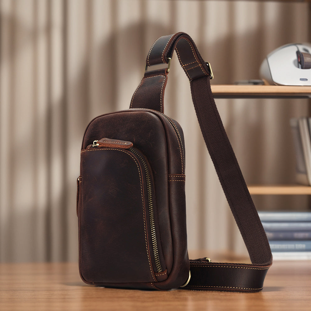 Dark brown men's sling chest bag, back view