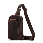Dark brown men's sling chest bag, flat lay