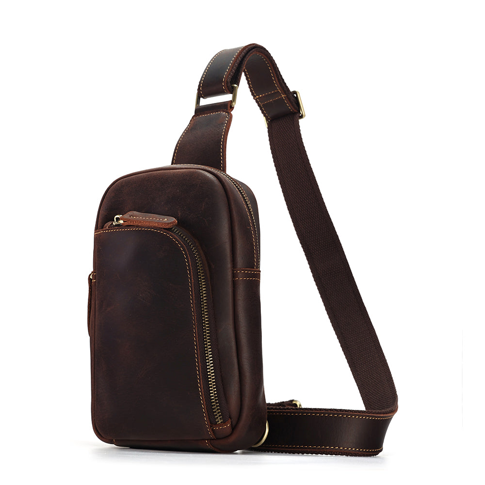 Dark brown men's sling chest bag, flat lay