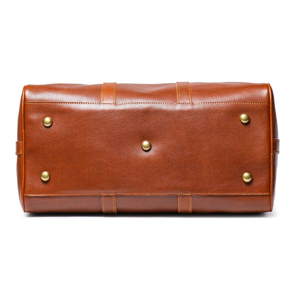 Brown men's duffle bag, tablet sleeve detail