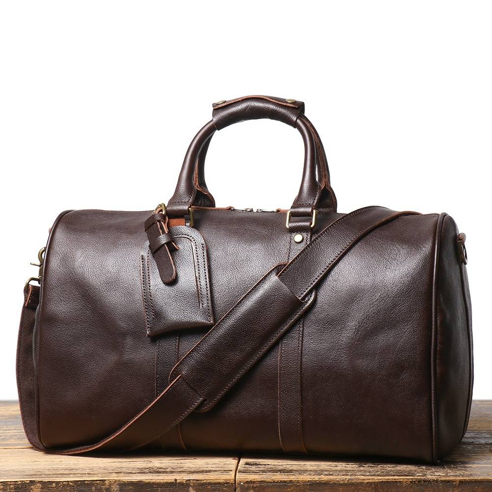 Dark brown men's duffle bag, leather grain