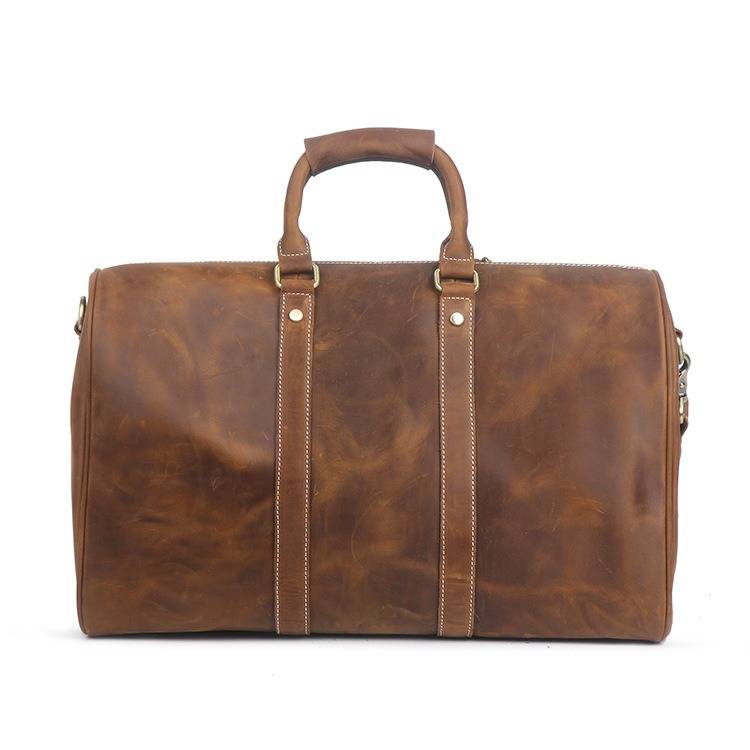 Vintage brown men's duffle bag, side view