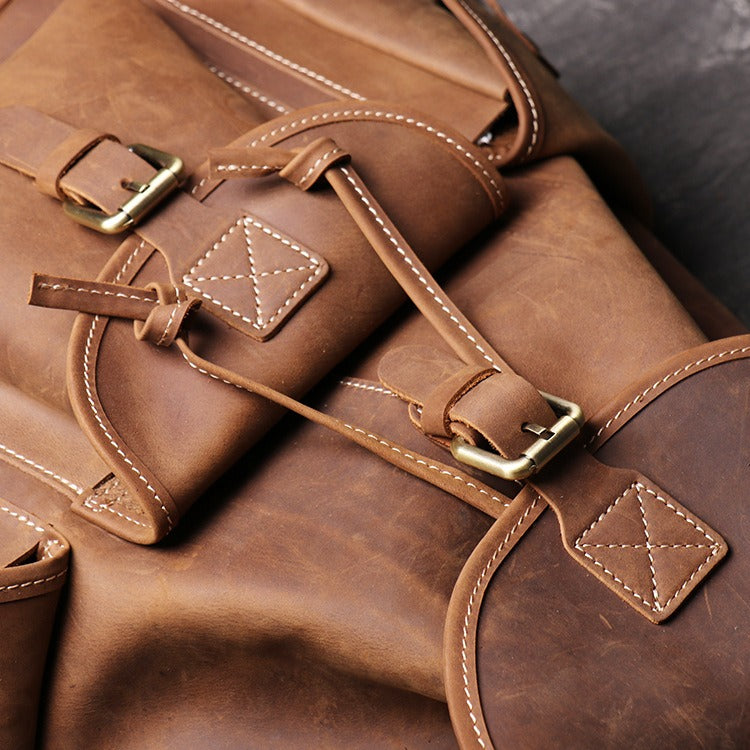 Brown men's travel backpack, interior view