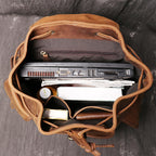 Brown men's travel backpack, buckle detail