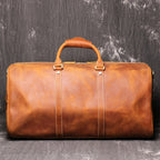 Brown men's travel bag, handle detail