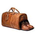 Brown men's travel bag, strap detail