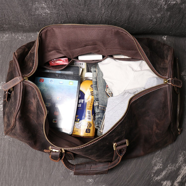 Dark brown men's travel bag, shoe compartment detail