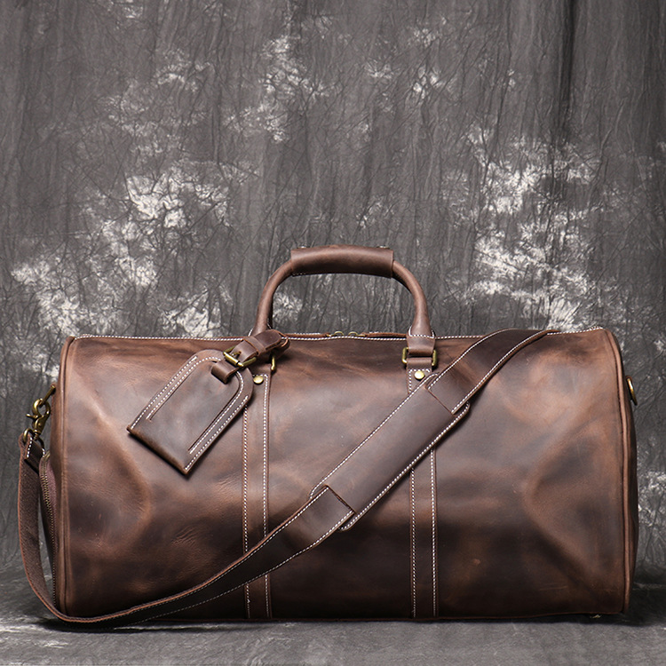 Dark brown men's travel bag, back view