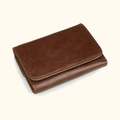 Brown men's trifold wallet, flat lay