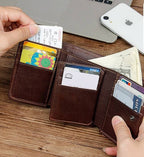 Dark brown men's trifold wallet, interior view