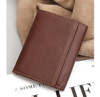 Brown men's trifold wallet, card slots