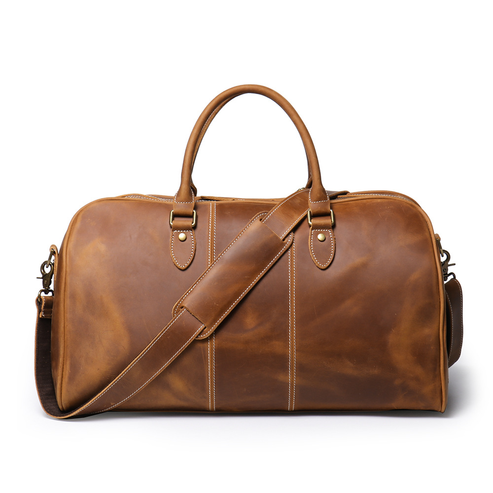 Brown men's weekend bag, handle detail