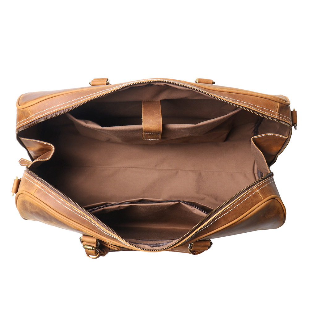Brown men's weekend bag, strap detail