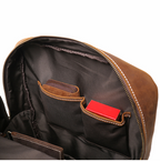 Brown men's weekender backpack, front pocket detail