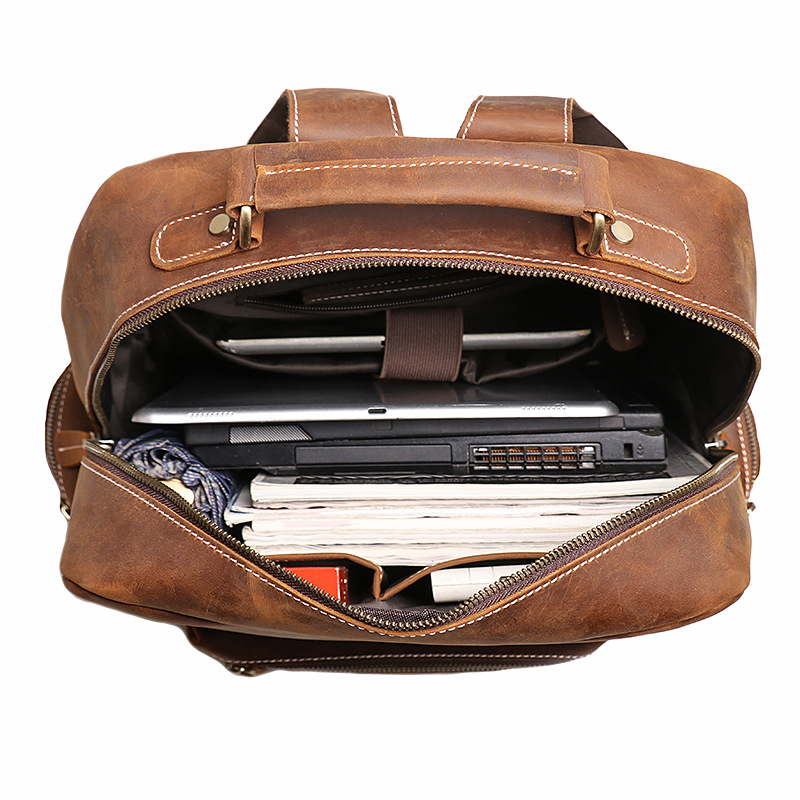 Brown men's weekender backpack, side pocket detail