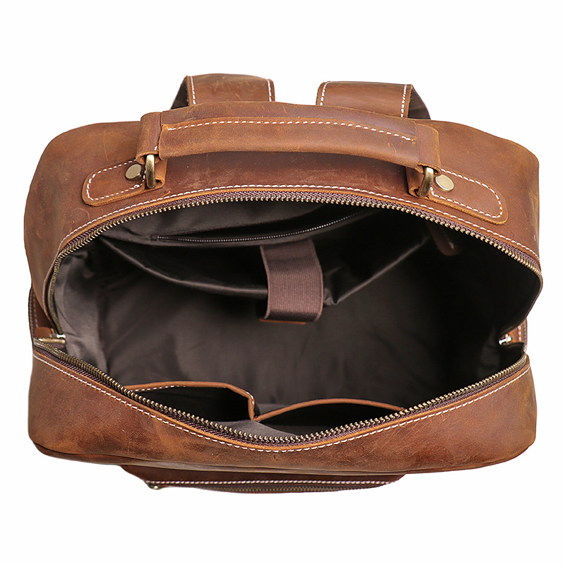 Brown men's weekender backpack, handle detail