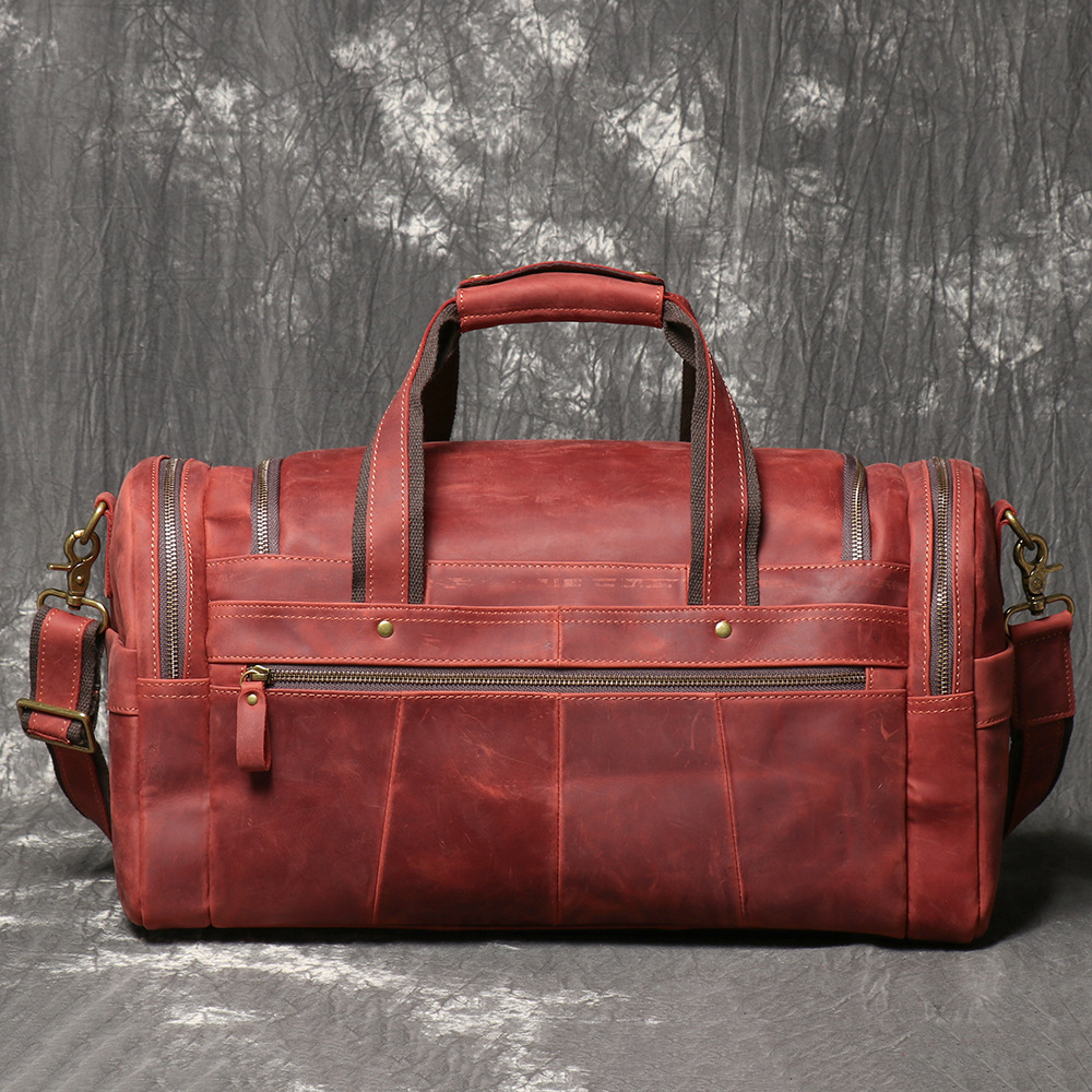 Red men's weekender bag, side view