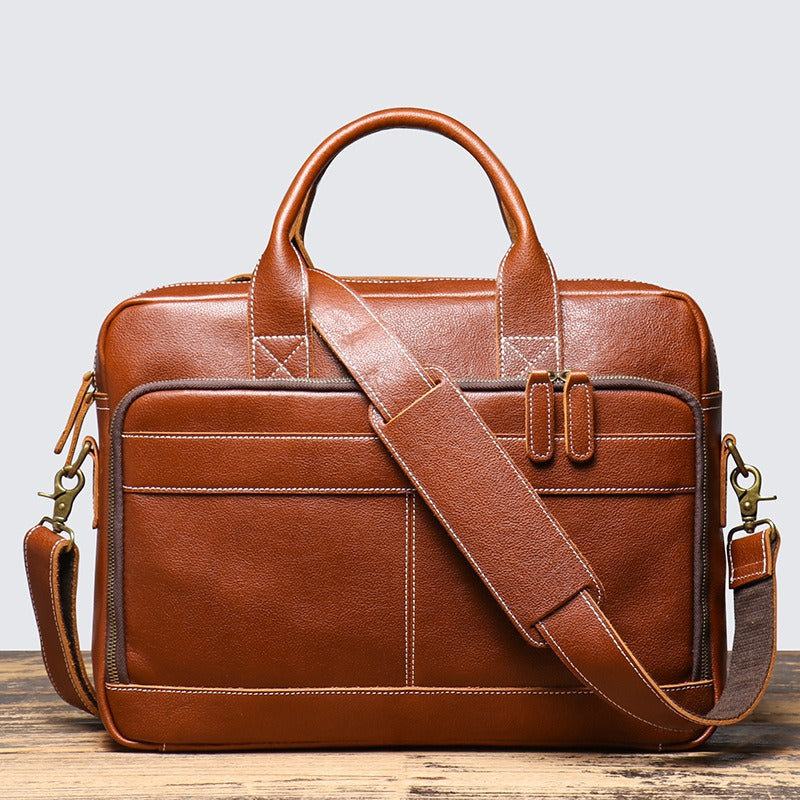 Brown men's work bag, buckle detail