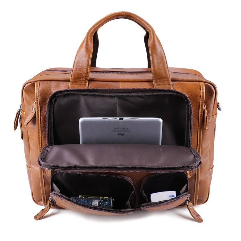 Man carrying the brown leather work tote