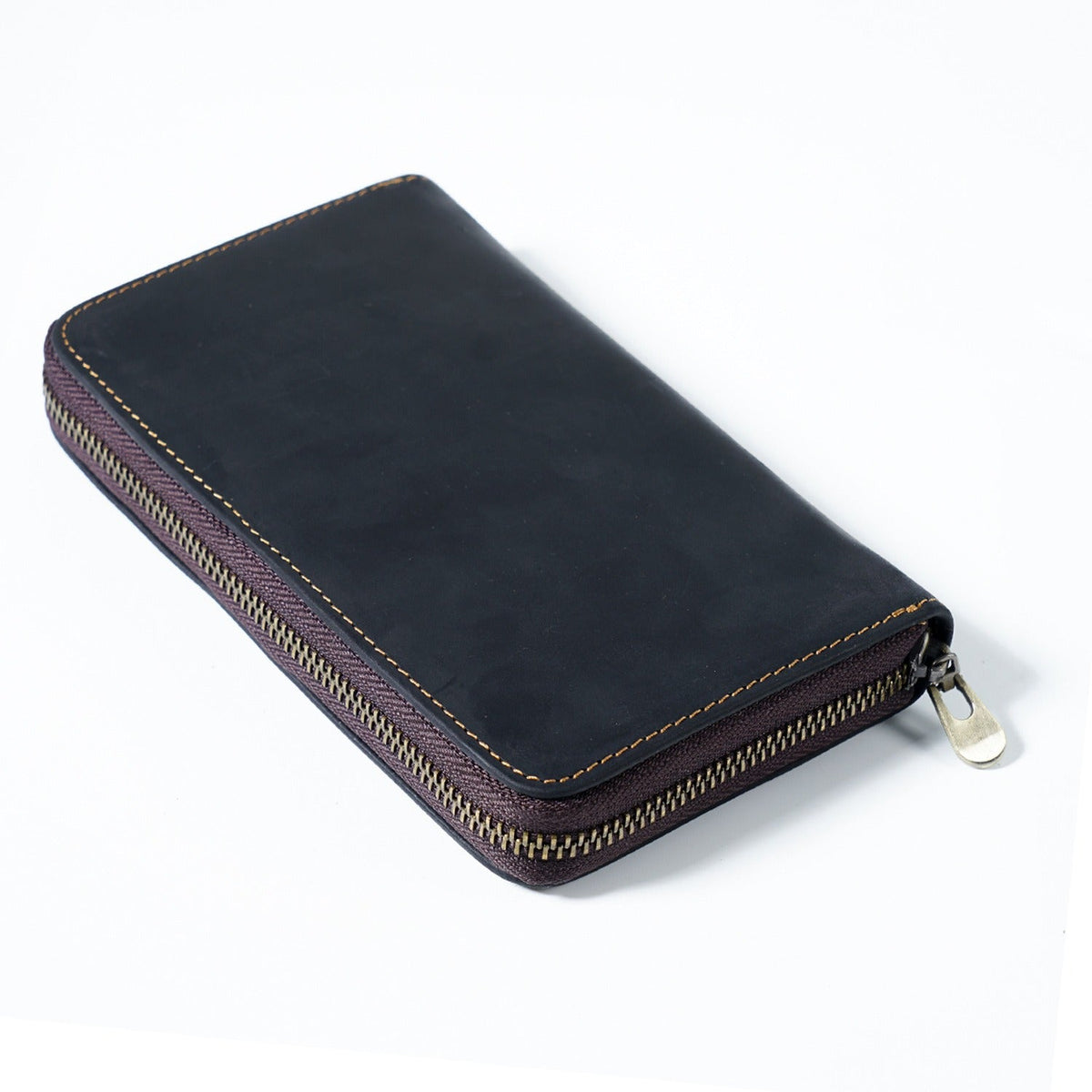 Black leather pen organizer case, book-fold design