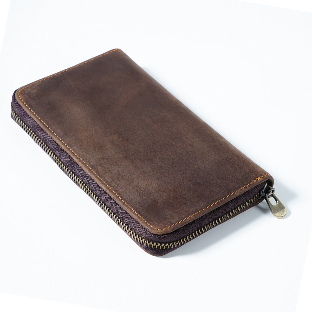 Dark brown leather book-fold pen organizer case