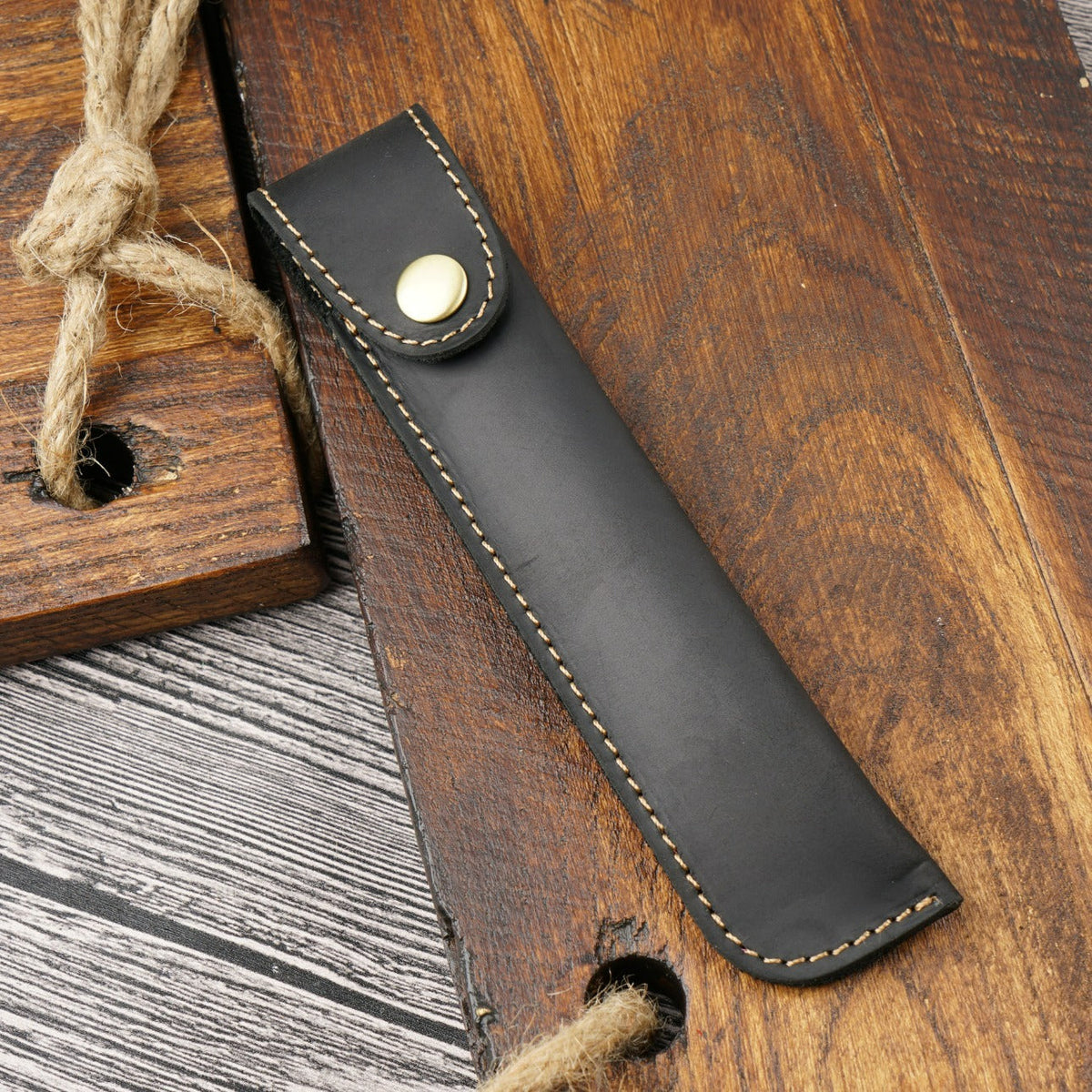 Black leather pen sleeve with snap closure