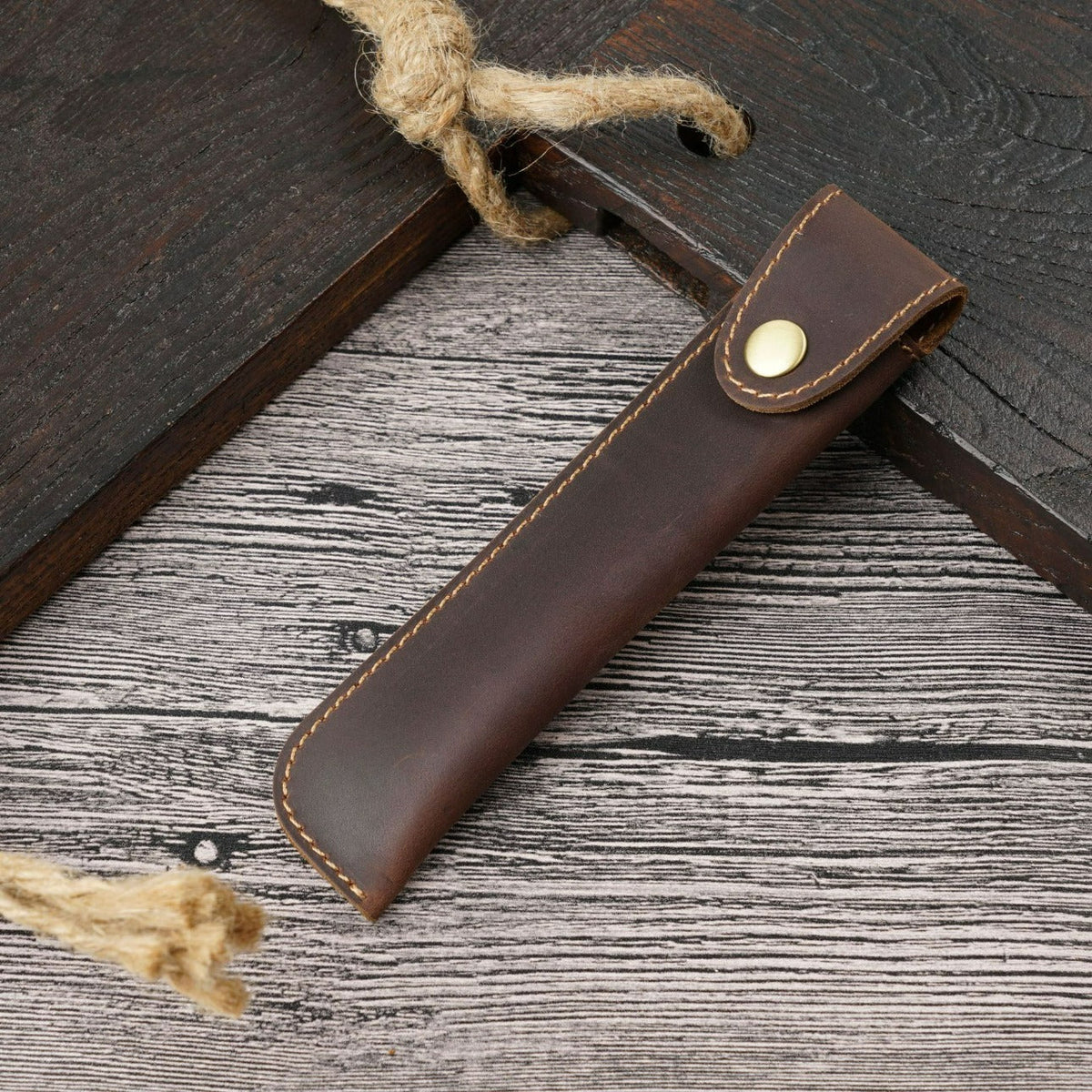 Dark brown leather single pen sleeve