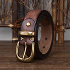 Dark brown men's leather belt buckle close-up