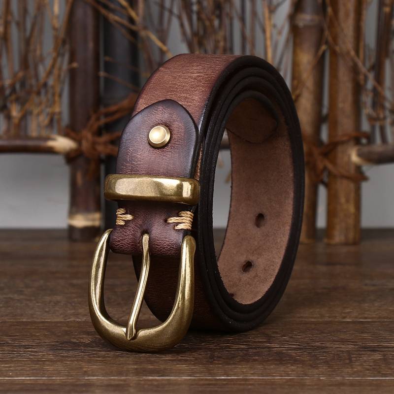 Dark brown men's leather belt buckle close-up