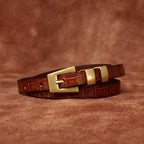 Brown women's belt, tip detail