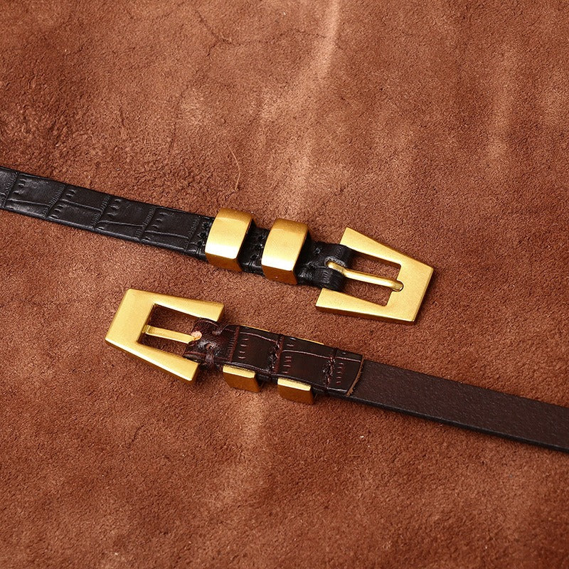 Brown women's belt, coiled view