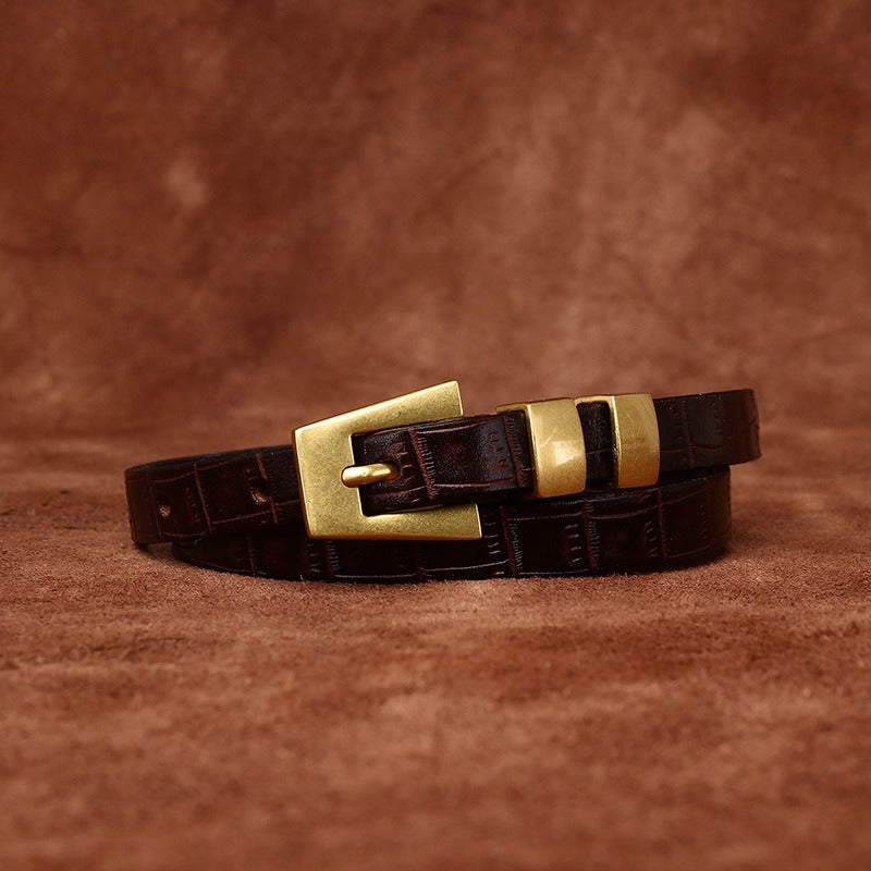 Dark brown women's belt, coiled view