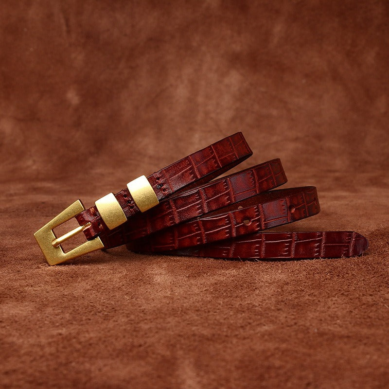 Red brown women's belt, coiled view