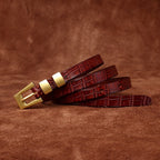 Red brown women's belt, coiled view