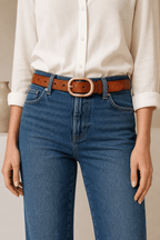 Brown women's fashion leather belt — model shot