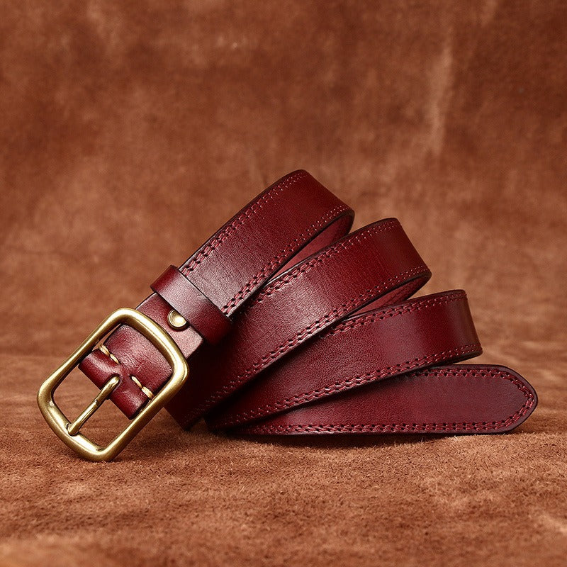 Red women's belt, coiled view