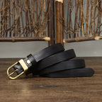 Black women's belt, brass buckle