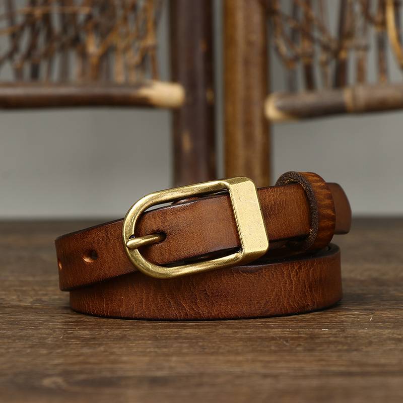 Brown women's belt, coiled view