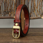 Red women's belt, coiled view