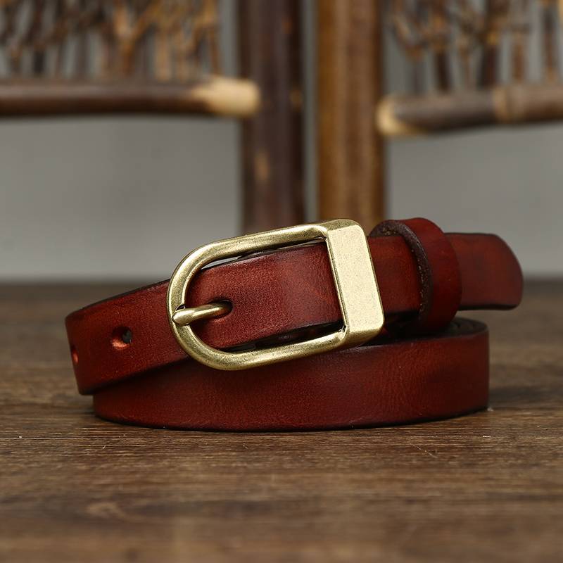 Red women's belt, brass buckle