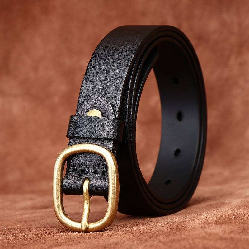 Black women's minimalist leather belt — coiled