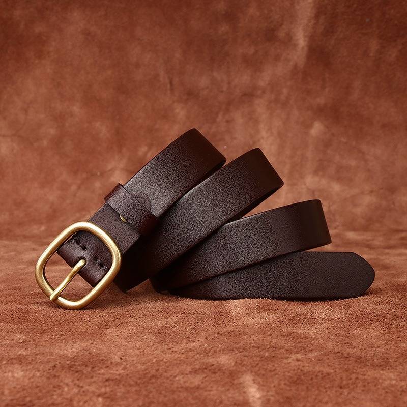 Dark brown women's minimalist leather belt — coiled