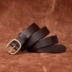 Dark brown women's minimalist leather belt — coiled