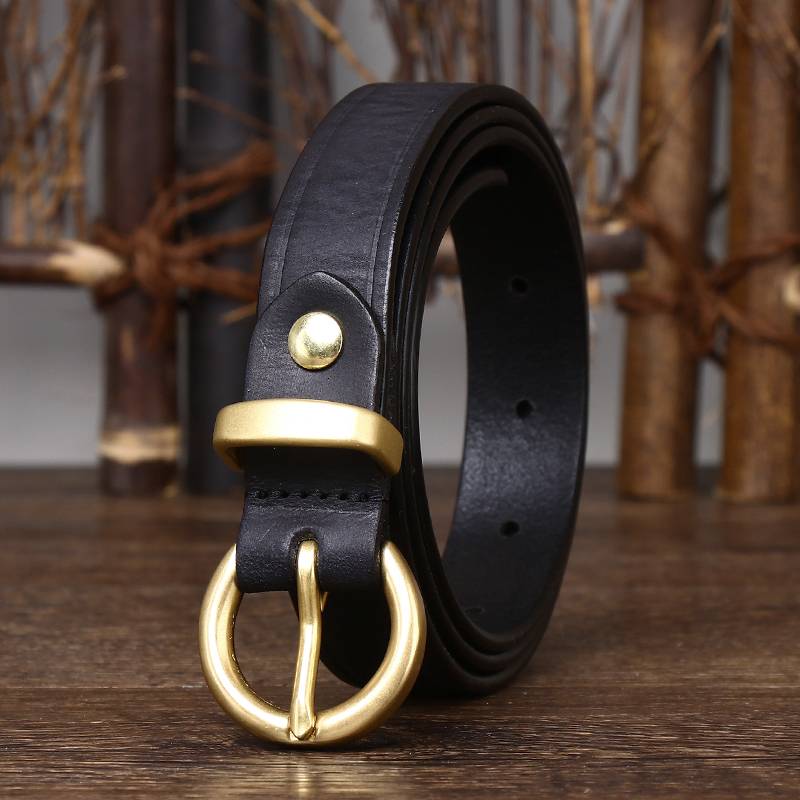 Black women's round buckle jeans belt detail