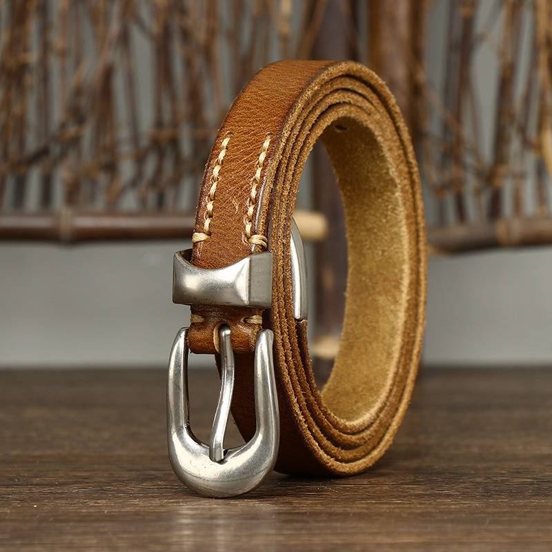 Brown women's belt, tip detail