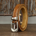 Brown women's belt, tip detail