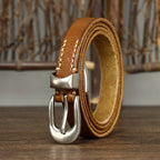 Brown women's belt, tip detail